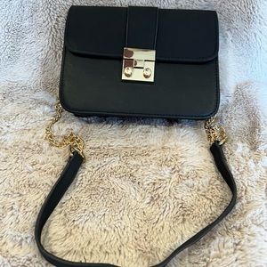 Black and gold mini crossbody bag